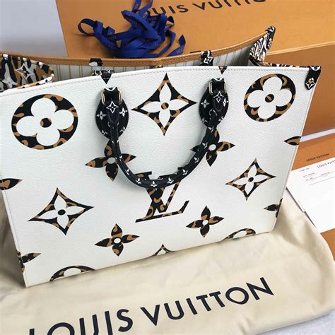 lv jungle on the go|OnTheGo MM Monogram .